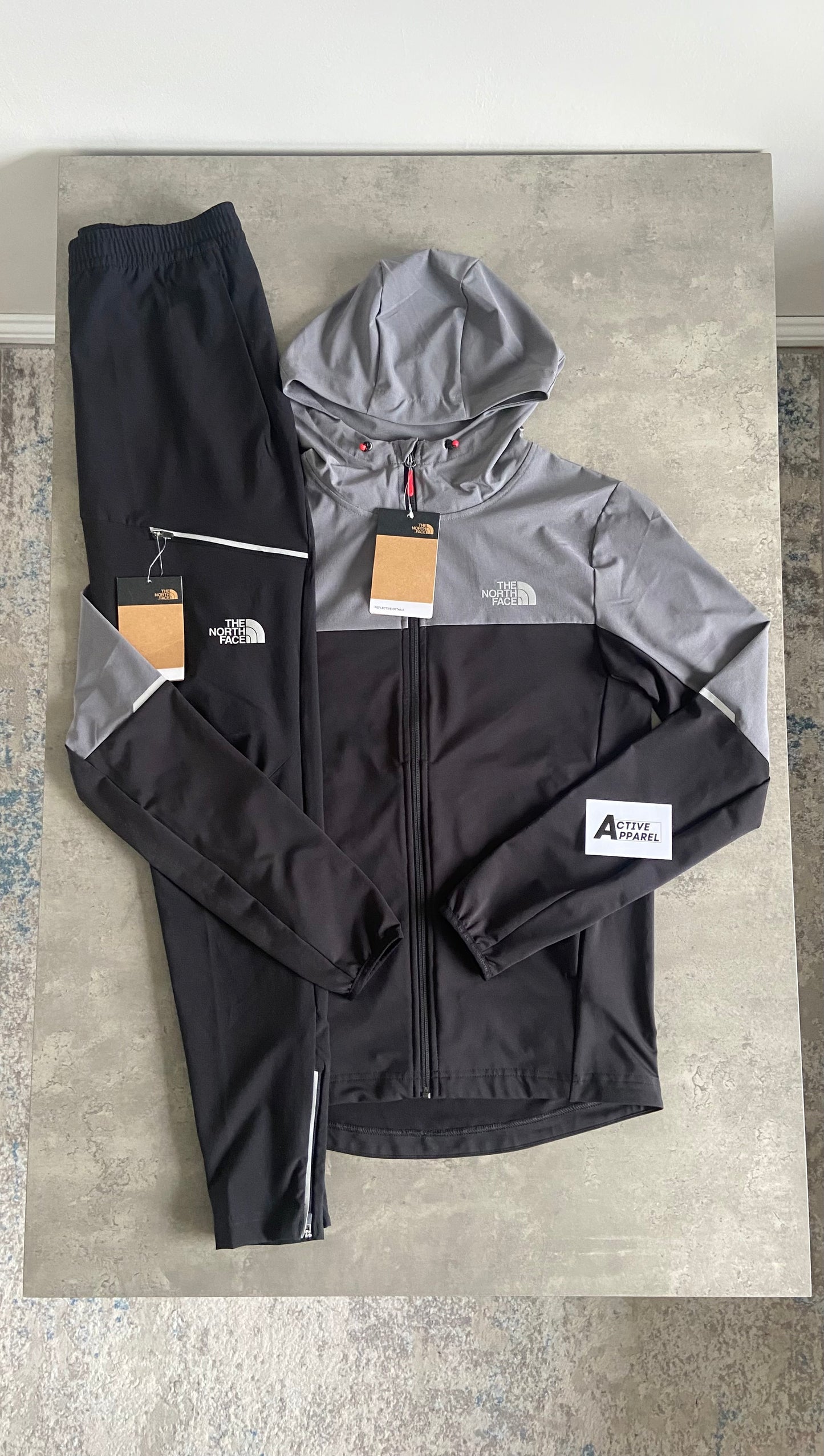 THE NORTH FACE WOVEN TRACKSUIT - CEMENT GREY/ BLACK