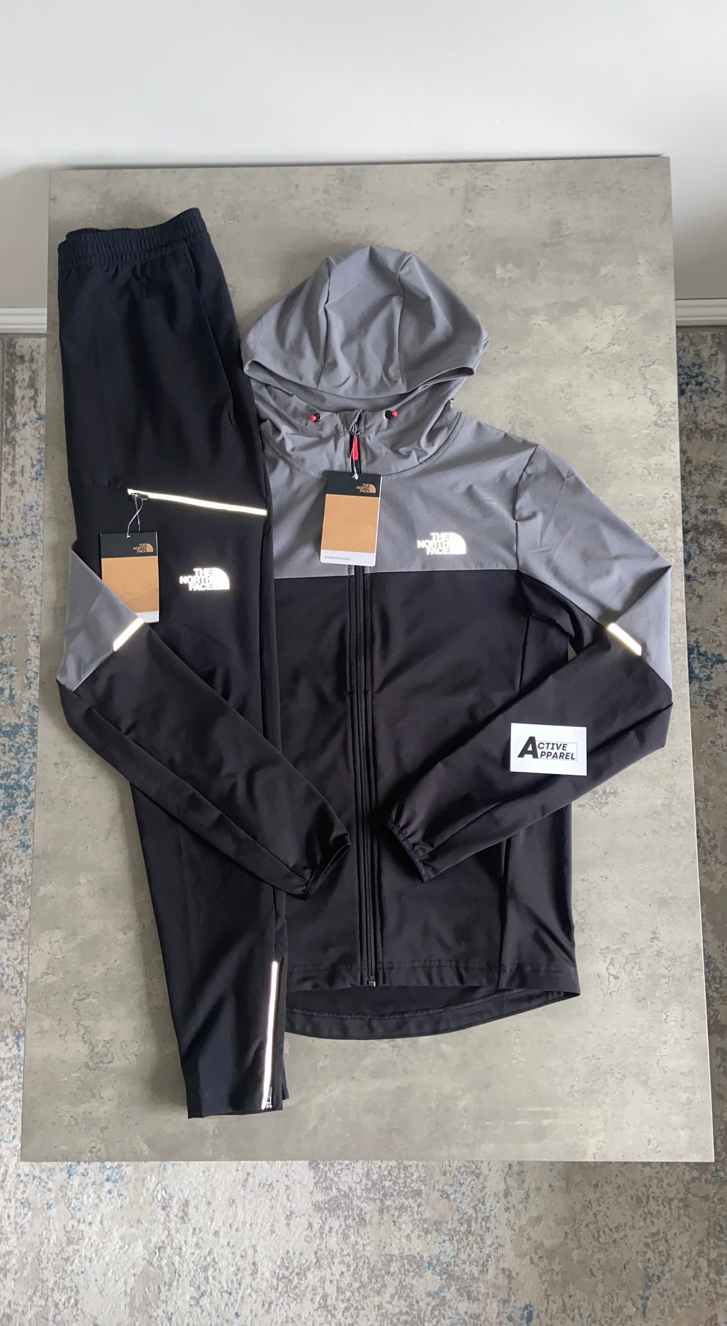 THE NORTH FACE WOVEN TRACKSUIT - CEMENT GREY/ BLACK
